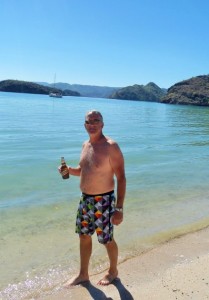 Chris like his cold beer on the beach