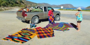 Pileo works hard as a beach vendor